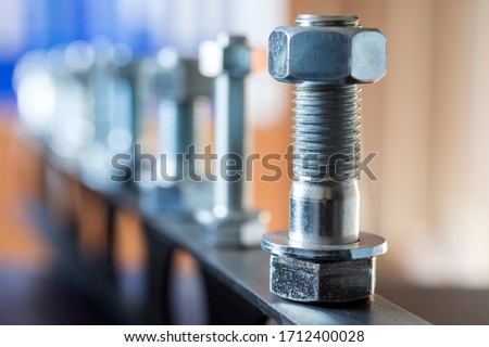 View of the bolts and nuts (fasteners). A bolt is a form of threaded fastener with an external male thread. Bolts are very closely related to screws. Bolts are often used to make a bolted joint.