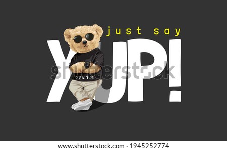say yup! slogan with bear doll in sunglasses leaning against letter on black background
