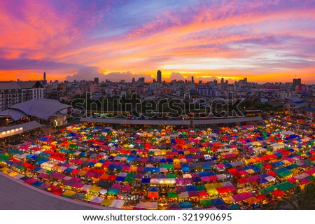 Bird eyes view of Multi-colored tents /Sales of second-hand market at twilight