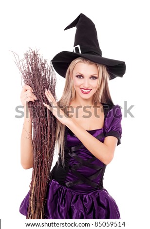 pretty sexy young blond witch with a broom, isolated against white background