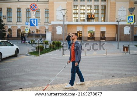 Similar – Image, Stock Photo man walking around on the street visiting Bilbao city Spain