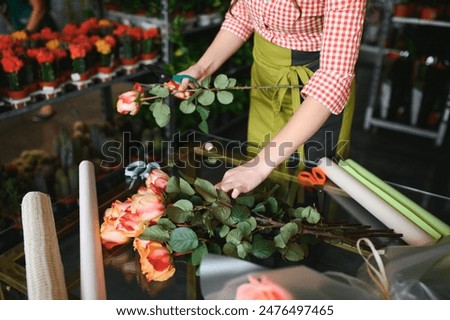 Similar – Image, Stock Photo Florist working Floristry