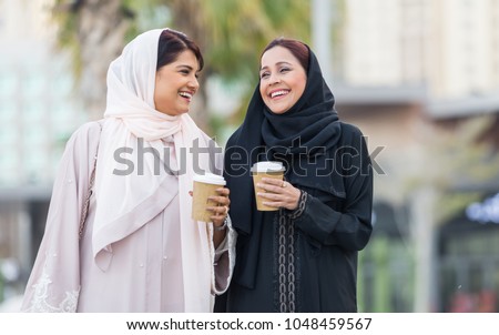 Image, Stock Photo Positive Arab woman having video call in park