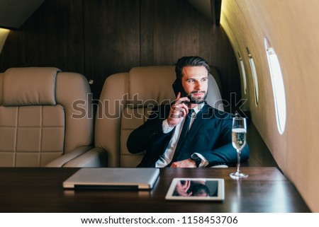 Businessman flying on his private jet Imagine de stoc © 