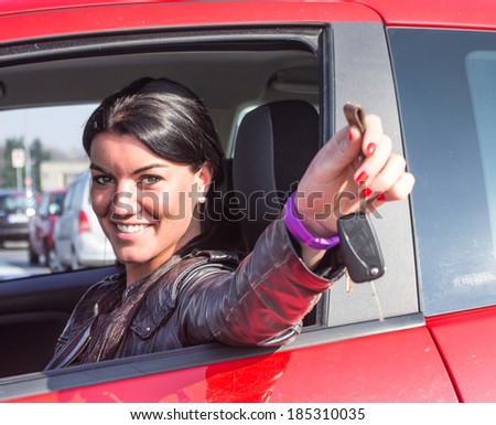 woman showing car keys