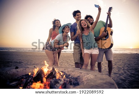 Similar – Image, Stock Photo Ethnic man smoking in studio with neon lights