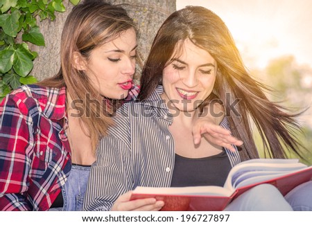 couple of girls studying in the nature