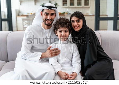 Similar – Image, Stock Photo Persian woman at home while looking through the window