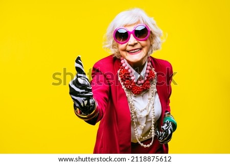 Similar – Image, Stock Photo Stylish elderly woman in round sunglasses