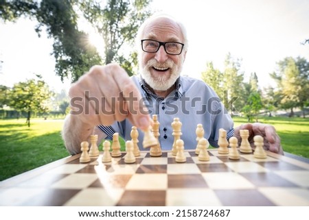 Similar – Image, Stock Photo Man plays chess