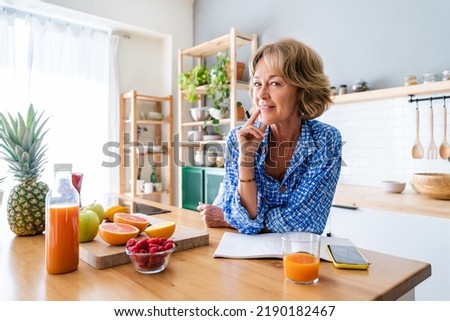 Similar – Image, Stock Photo 60 year old lady with scarf in autumn landscape