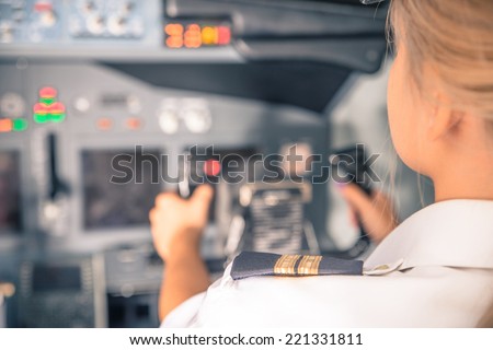 woman co-pilot having flight control