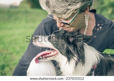 woman with her dog sharing emotions. concept about animals and pets