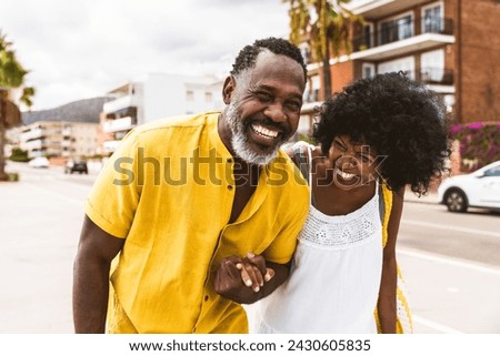 Similar – Image, Stock Photo Beautiful couple having fun in sunflowers field. A man and a woman in love walk in a field with sunflowers, a man hugs a woman. selective focus