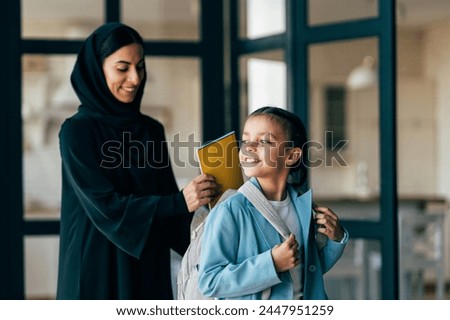 Similar – Image, Stock Photo Persian woman at home while looking through the window