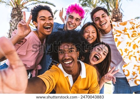 Similar – Image, Stock Photo A happy teenager is texting on a mobile phone, lying on the floor in the living room. Modern technologies, online communication