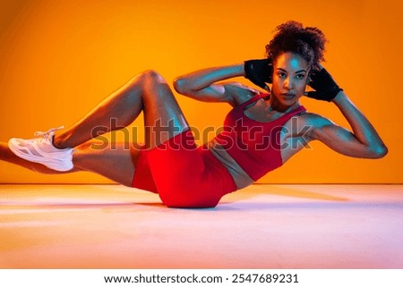 Similar – Image, Stock Photo Fit female athlete doing bound angle pose