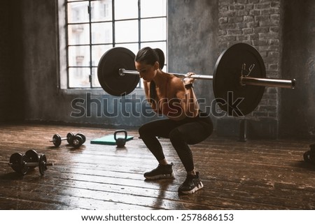 Similar – Image, Stock Photo Female athlete doing pull up exercises