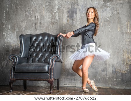 classic dancer posing for fashion studio shooting. concept about dancing, fashion, beauty and people