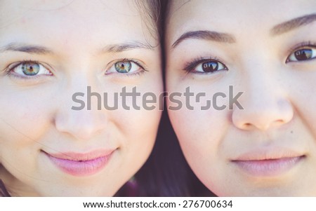 two young women portrait. concept about diversity, beauty and people