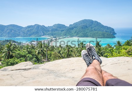 man enjoying the view in phi phi island view point. concept about summer, vacations, and people