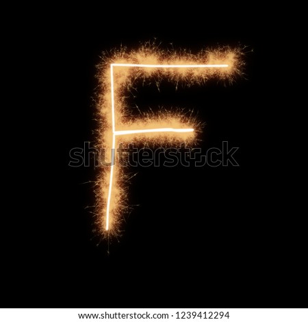 Letter F Of Alphabet Written By Squib Sparks On A Black Background 1239412294 Letter F Of Alphabet Written By Squib Sparks On A Black Background 1239412294