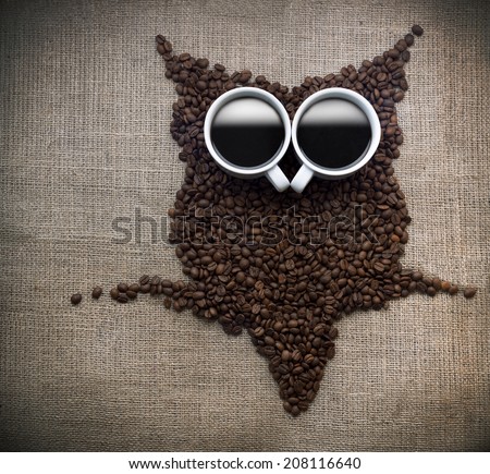 Coffee bean owl, Owl silhouette made with coffee beans on a coffee sack.
