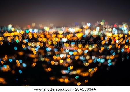 Abstract love or heart bokeh background of Kuala Lumpur city at night
