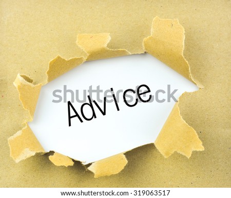 Business concept: torn paper with word Advice on Paper background
