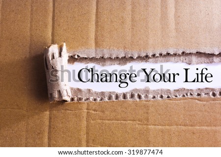 Torn paper box with word Change your life