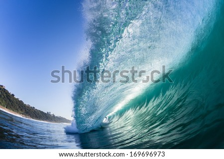Ocean Wave Crashing  Swimming view of wave curling and crashing onto shallow reefs under the water lip