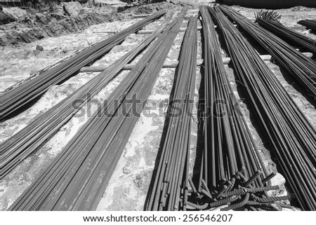 Construction Concrete Steel Rods\
Construction steel metal rods for concrete strengthening of new structures black and white vintage