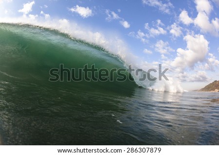 Wave Blue Sky\
Wave ocean crashing breaking hollow water power swimming inside  closeup