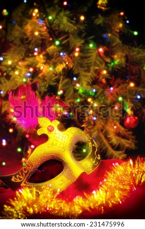 new year, christmas card with carnival mask and Christmas decorations, composition shifted labeling