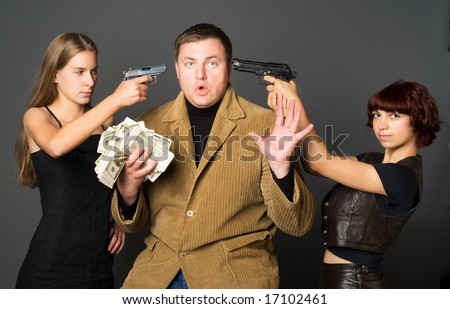 Two girls with guns and gangster with money.
