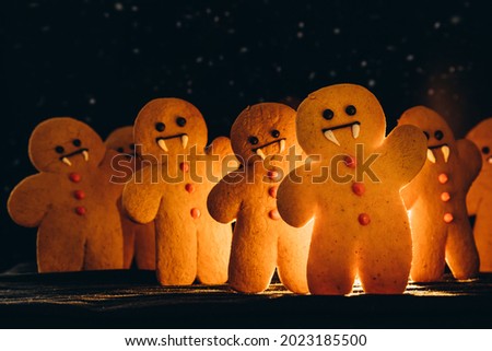 Scary halloween cookies, selective focus decoration on the black background. Halloween style