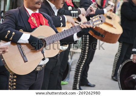 Image, Stock Photo Man playing a spanish guitar and recording with a microphone