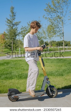 Similar – Image, Stock Photo Activating electric scooter from smartphone