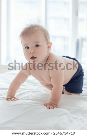 Similar – Image, Stock Photo Portrait of a 9 year old boy outdoors, with his hands aroung his eyes, like he’s using binoculars, wearing casual clothes