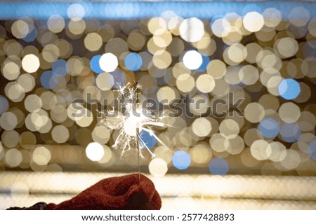 Similar – Image, Stock Photo Burning sparkler against black background