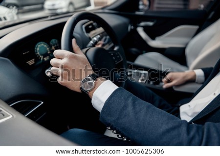 Similar – Image, Stock Photo Unrecognizable man driving car in Ireland