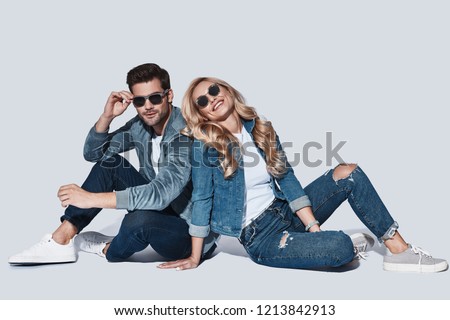 Similar – Image, Stock Photo Elegant woman sitting against brick wall