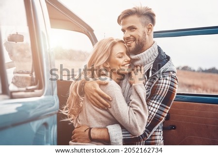 Similar – Image, Stock Photo Young Man smiling while talking to someone on his laptop.