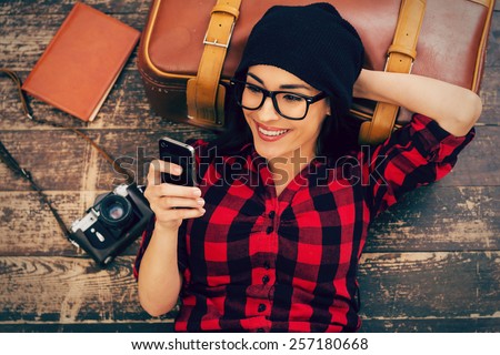 Similar – Image, Stock Photo Tranquil woman with retro lamp in dark room