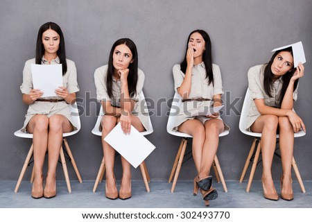 Waiting for interview. Digital composite of young businesswoman expressing different emotions while holding paper and sitting at the chair against grey background