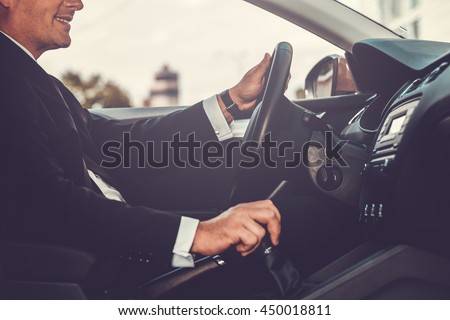 Similar – Image, Stock Photo Unrecognizable man driving car in Ireland