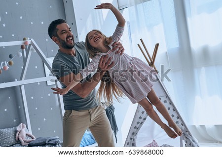 Similar – Image, Stock Photo Father with daughter barefoot on grass