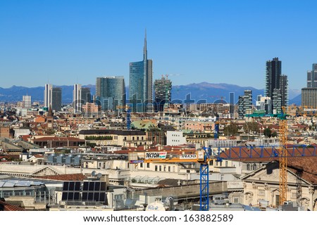 MILAN - NOVEMBER 12: View of Milan modern skyline growing from Duomo at Piazza Duomo , Milan, Italy in November 12, 2013.