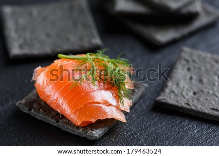 Smoked Salmon on charcoal crackers