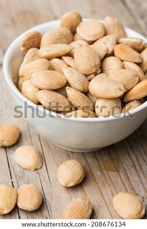 Roasted and salted almonds in a bowl